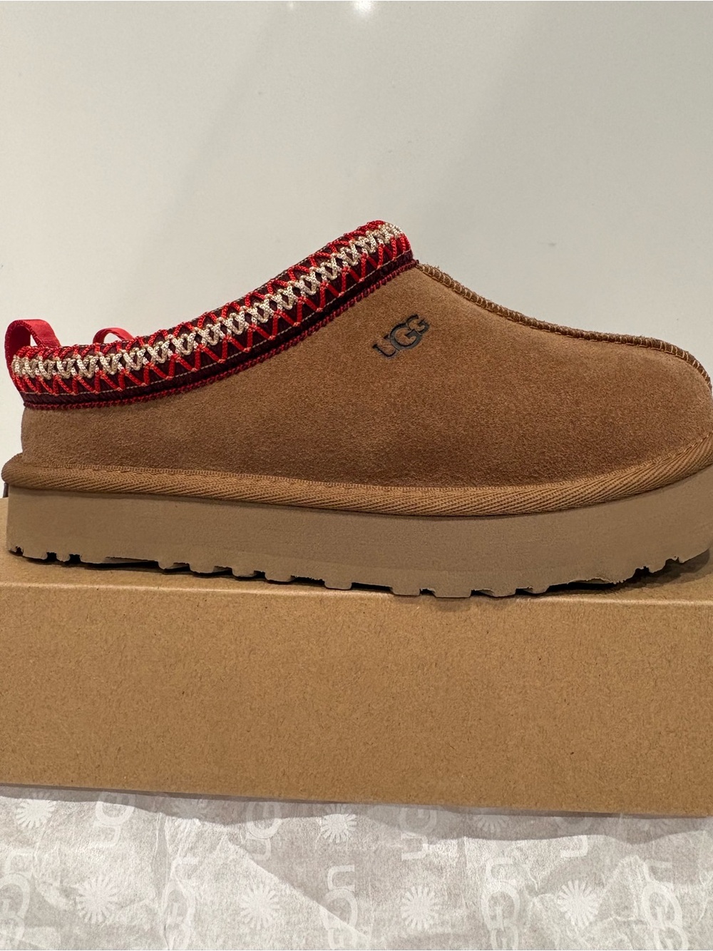 UGG Kids Chestnut Suede Tazz Slippers with Red and Cream Trim Size 1